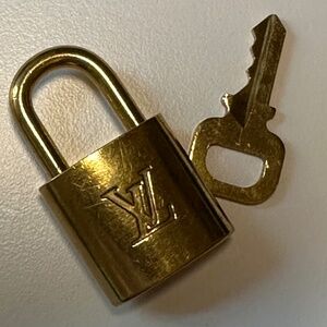 PRICE DROP!!!  GENUINE brass Louis Vuitton lock and key